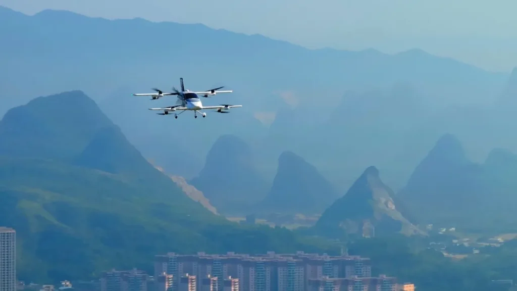 eVTOL aircraft flying over mountain city landscape