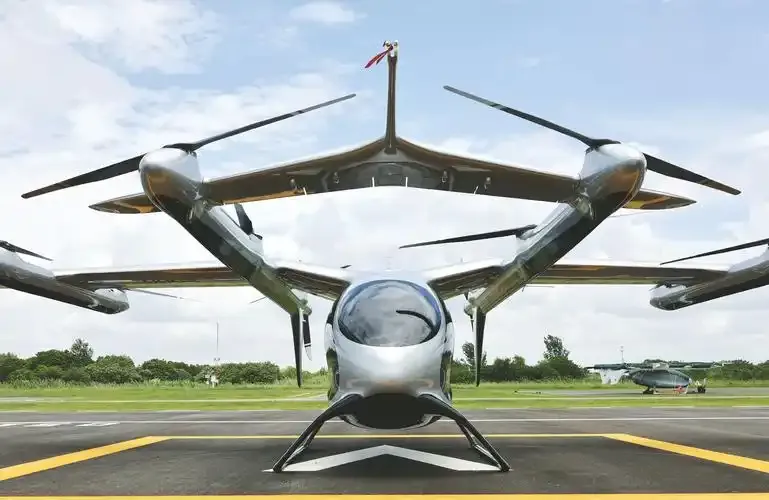 Front view of a futuristic eVTOL aircraft on a runway