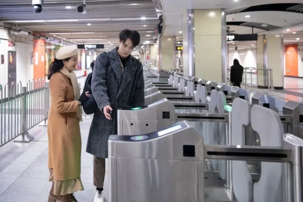 Passengers using subway ticket gates in China
