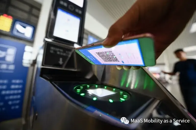 Passenger scanning a transit QR code