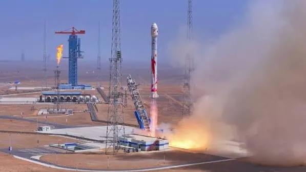 Zhuque rocket lifting off from launch site
